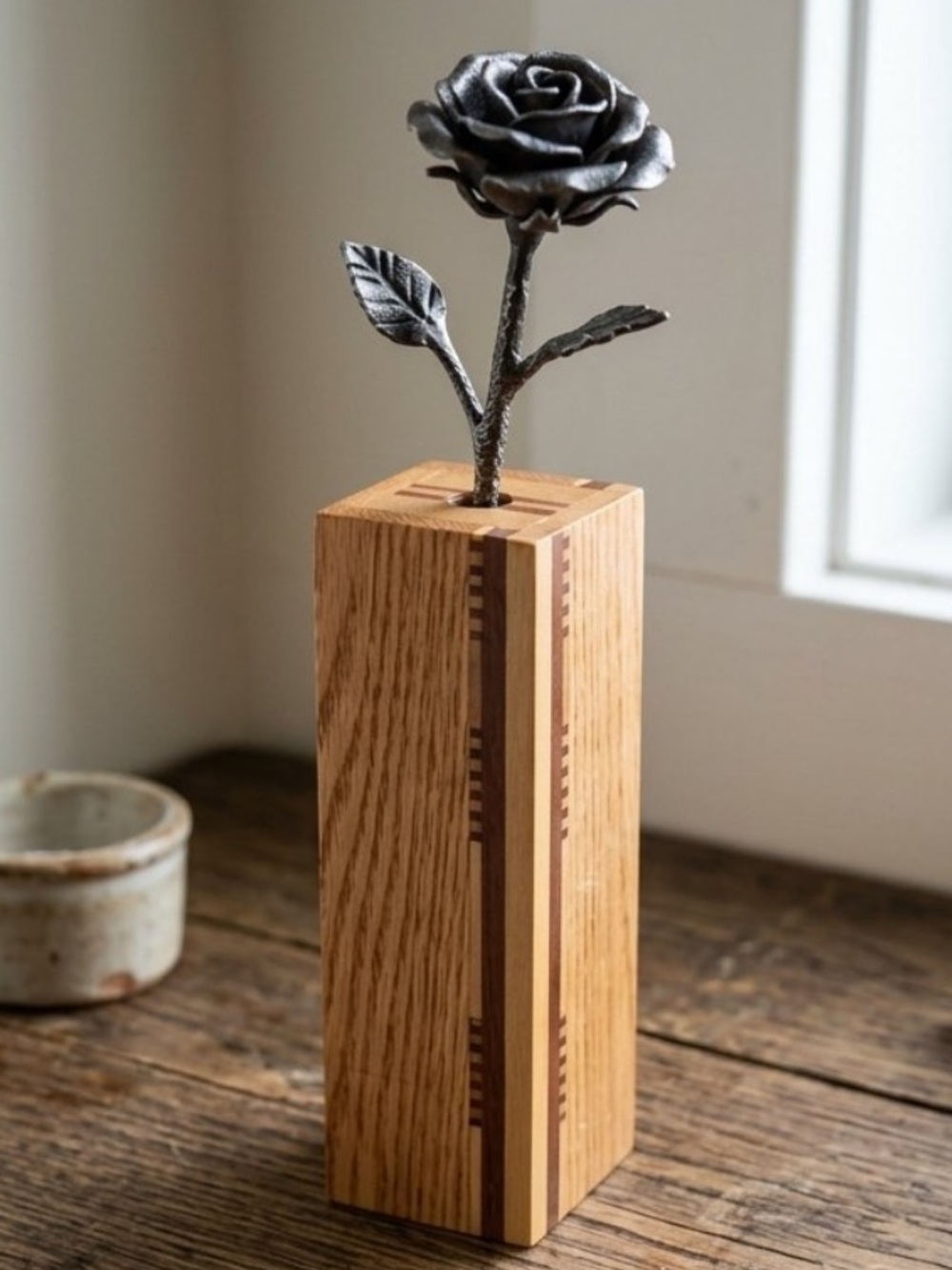 Handcrafted wooden bud vase or a small decorative pillar 
contrasting wood
